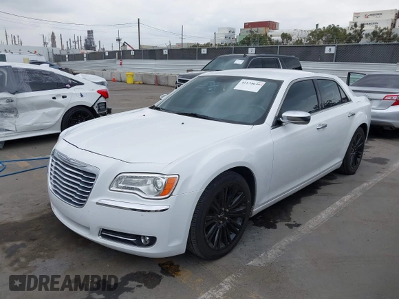 2012 Chrysler 300 Limited with VIN 2C3CCACG2CH237841, listed as a IAAI auction lot 42134640 with 140,554 mi miles. Bid and sale history available at carsss.com. Image 2.