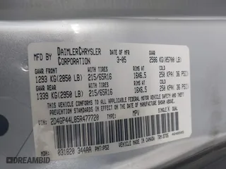 2005 Dodge Caravan SXT with VIN 2D4GP44L85R477720, listed as a IAAI auction lot 41925419 with 202,972 mi miles. Bid and sale history available at carsss.com. Image 9.