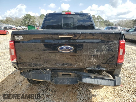 2022 Ford F-150 XL with VIN 1FTFW1E55NFA77499, listed as a Copart auction lot 48509815 with 98,143 mi miles and Salvage Title. Bid and sale history available at DreamBid. Image 6.