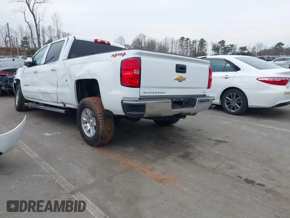 2018 Chevrolet Silverado 1500 LT with VIN 1GCUKREC0JF208509, listed as a IAAI auction lot 41794616 with 96,962 mi miles and . Bid and sale history available at DreamBid. Image 3.