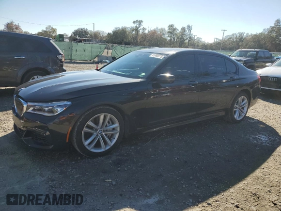 2016 BMW 7 Series 750i with VIN WBA7F0C5XGGL99549, listed as a Copart auction lot 41880015 with 54,181 mi miles and Salvage Title. Bid and sale history available at carsss.com. Image 1.