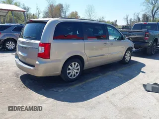 2013 Chrysler Town & Country Touring with VIN 2C4RC1BG2DR605857, listed as a IAAI auction lot 42001954 with 158,445 mi miles. Bid and sale history available at carsss.com. Image 4.