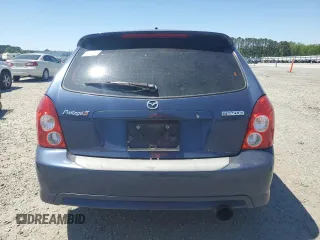 2003 Mazda Protege z VIN JM1BJ246731194976, wystawiony jako Copart lot #53281695 z przebiegiem 217 386 mil mil oraz Szkoda całkowita • Salvage title. Historia ofert i sprzedaży dostępna na DreamBid. Obrazek 6.