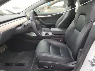 2022 Tesla Model 3 Long Range with VIN 5YJ3E1EB5NF334516, listed as a Copart auction lot 43247755 with 23,412 mi miles and Salvage Title. Bid and sale history available at DreamBid. Image 7.