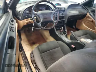 1996 Ford Mustang GT z VIN 1FALP42X5TF191769, wystawiony jako Copart lot #49364525 z przebiegiem 69 029 mil mil oraz Szkoda całkowita • Salvage title. Historia ofert i sprzedaży dostępna na DreamBid. Obrazek 8.