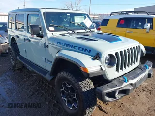 2023 Jeep Wrangler Rubicon with VIN 1C4JJXR60PW580956, listed as a IAAI auction lot 41652975 with 15,878 mi miles and . Bid and sale history available at DreamBid. Image 1.