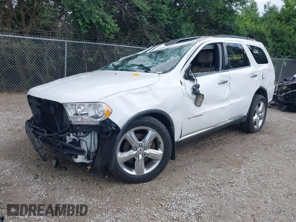 2013 Dodge Durango Citadel with VIN 1C4RDJEGXDC559700, listed as a IAAI auction lot 42468665 with 138,967 mi miles and . Bid and sale history available at DreamBid. Image 2.
