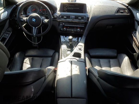 2014 BMW M6 z VIN WBS6C9C51EDV73883, wystawiony jako Copart lot #76395574 z przebiegiem 57 995 mil mil oraz Czysty tytuł • Clean title. Historia ofert i sprzedaży dostępna na DreamBid. Obrazek 8.