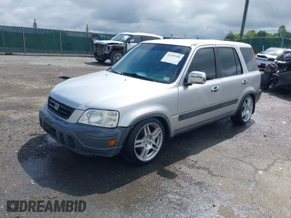 1997 Honda CR-V z VIN JHLRD1848VC057743, wystawiony jako IAAI lot #42259350 z przebiegiem 218 641 mil mil oraz . Historia ofert i sprzedaży dostępna na DreamBid. Obrazek 18.