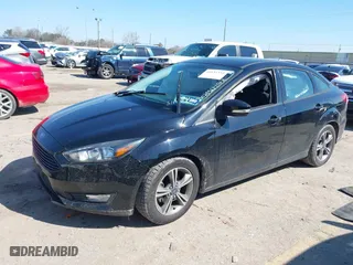 2017 Ford Focus SE with VIN 1FADP3FEXHL285100, listed as a IAAI auction lot 41631354 with 33,371 mi miles. Bid and sale history available at carsss.com. Image 17.