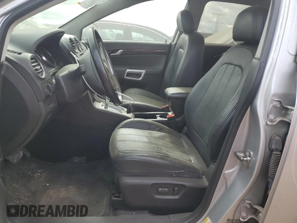 2014 Chevrolet Captiva Sport LT with VIN 3GNAL3EK9ES640609, listed as a Copart auction lot 74691734 with 150,482 mi miles and Salvage Title. Bid and sale history available at DreamBid. Image 7.