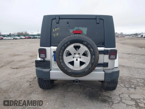 2008 Jeep Wrangler Unlimited Sahara с VIN 1J4GA59138L505460, выставлен на аукционе IAAI как лот 41846611 с пробегом 116 658 миль миль и . История ставок и продаж доступна на DreamBid. Изображение 16.