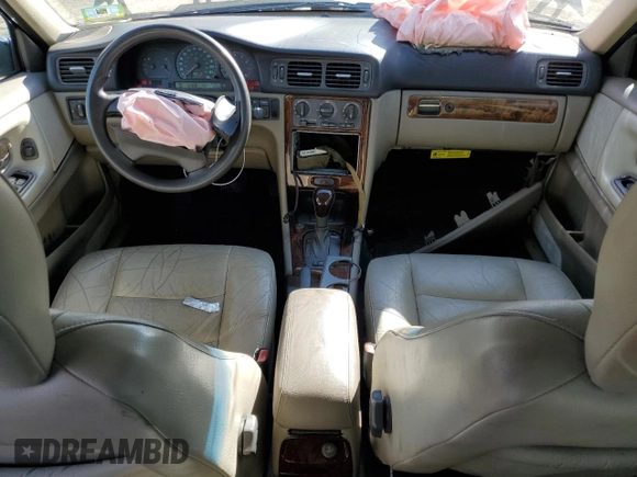 1998 Volvo S70 z VIN YV1LS5340W1425573, wystawiony jako Copart lot #75317244 z przebiegiem 403 370 mil mil oraz Szkoda całkowita • Salvage title. Historia ofert i sprzedaży dostępna na DreamBid. Obrazek 8.