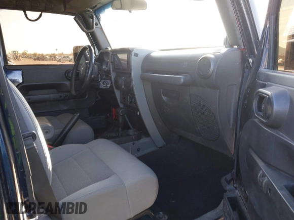 2008 Jeep Wrangler Unlimited Rubicon with VIN 1J8GA69158L616452, listed as a IAAI auction lot 41391875 with 91,143 mi miles and . Bid and sale history available at DreamBid. Image 5.