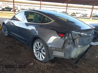 2018 Tesla Model 3 Long Range Battery with VIN 5YJ3E1EA3JF169132, listed as a IAAI auction lot 41678383 with 170,809 mi miles and . Bid and sale history available at DreamBid. Image 3.