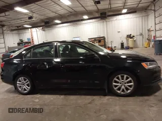 2015 Volkswagen Jetta S with VIN 3VW2K7AJ4FM243087, listed as a IAAI auction lot 42525961 with 118,224 mi miles and . Bid and sale history available at DreamBid. Image 14.