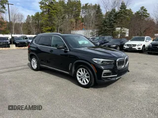 2019 BMW X5 xDrive40i z VIN 5UXCR6C57KLL62128, wystawiony jako Copart lot #49959995 z przebiegiem 154 636 mil mil oraz Czysty tytuł • Clean title. Historia ofert i sprzedaży dostępna na DreamBid. Obrazek 1.