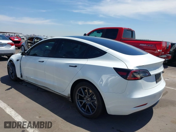 2022 Tesla Model 3 Long Range z VIN 5YJ3E1EB3NF348267, wystawiony jako IAAI lot #42323616 z przebiegiem Nie podano mil oraz . Historia ofert i sprzedaży dostępna na DreamBid. Obrazek 3.