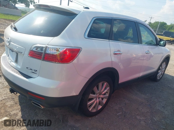 2010 Mazda CX-9 Grand Touring z VIN JM3TB3MV4A0234374, wystawiony jako IAAI lot #42411065 z przebiegiem 189 842 mil mil oraz . Historia ofert i sprzedaży dostępna na DreamBid. Obrazek 4.