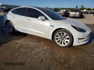2019 Tesla Model 3 Mid Range z VIN 5YJ3E1EA1KF434552, wystawiony jako Copart lot #48161785 z przebiegiem 57 558 mil mil oraz Tytuł czysty. Historia ofert i sprzedaży dostępna na DreamBid. Obrazek 4.
