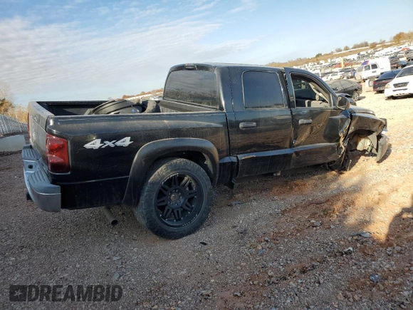2005 Dodge Dakota SLT z VIN 1D7HW48K45S139614, wystawiony jako Copart lot #83898134 z przebiegiem 200 188 mil mil oraz Szkoda całkowita • Salvage title. Historia ofert i sprzedaży dostępna na DreamBid. Obrazek 3.