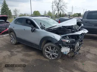 2021 Mazda CX-30 Preferred z VIN 3MVDMBCL6MM240663, wystawiony jako IAAI lot #42165803 z przebiegiem 52 262 mil mil oraz . Historia ofert i sprzedaży dostępna na DreamBid. Obrazek 1.
