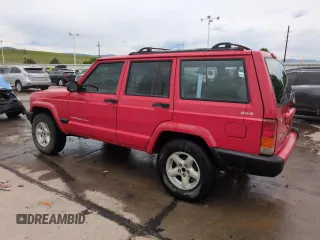 1999 Jeep Cherokee Sport with VIN 1J4FF68S2XL648735, listed as a Copart auction lot 58758115 with 252,248 mi miles and Salvage title. Bid and sale history available at DreamBid. Image 2.