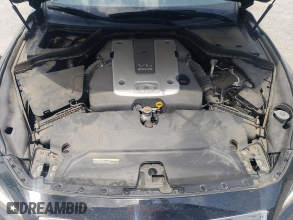 2015 Infiniti Q50 Premium z VIN JN1BV7AR1FM403585, wystawiony jako Copart lot #55662155 z przebiegiem 102 331 mil mil oraz Tytuł czysty. Historia ofert i sprzedaży dostępna na DreamBid. Obrazek 11.