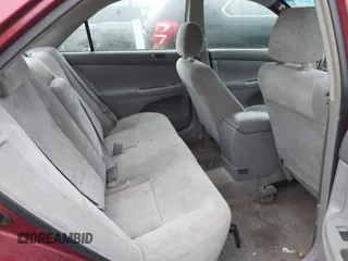 2003 Toyota Camry LE with VIN JTDBE32K630159278, listed as a IAAI auction lot 42148712 with 184,999 mi miles and . Bid and sale history available at DreamBid. Image 8.