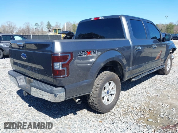 2018 Ford F-150 XL with VIN 1FTEW1E56JFC63963, listed as a IAAI auction lot 41776075 with 176,140 mi miles. Bid and sale history available at carsss.com. Image 4.