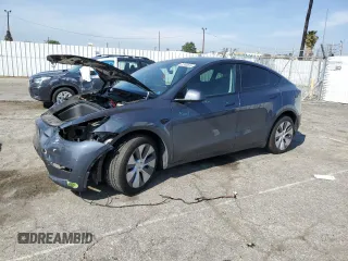 2023 Tesla Model Y Long Range z VIN 7SAYGDEE7PA033924, wystawiony jako Copart lot #51588835 z przebiegiem 20 924 mil mil oraz Szkoda całkowita • Salvage title. Historia ofert i sprzedaży dostępna na DreamBid. Obrazek 1.