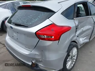 2015 Ford Focus Titanium with VIN 1FADP3N23FL356822, listed as a IAAI auction lot 41981053 with 115,584 mi miles and . Bid and sale history available at DreamBid. Image 18.