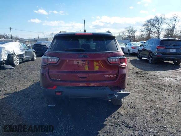 2020 Jeep Compass Trailhawk with VIN 3C4NJDDB2LT239384, listed as a IAAI auction lot 41527372 with 56,122 mi miles and . Bid and sale history available at carsss.com. Image 16.