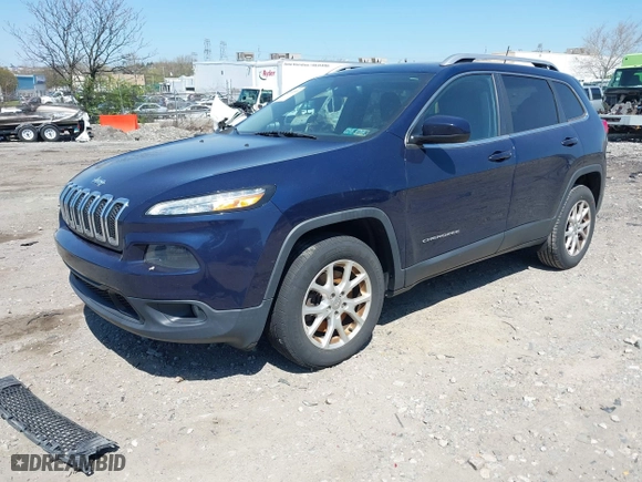 2016 Jeep Cherokee Latitude with VIN 1C4PJMCB1GW131963, listed as a IAAI auction lot 42065593 with 129,748 mi miles. Bid and sale history available at carsss.com. Image 16.