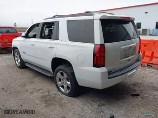 2018 Chevrolet Tahoe LT with VIN 1GNSCBKC3JR138624, listed as a IAAI auction lot 41483062 with 80,107 mi miles. Bid and sale history available at carsss.com. Image 3.