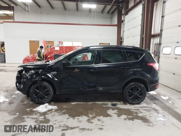 2018 Ford Escape SE with VIN 1FMCU9GD7JUD36295, listed as a IAAI auction lot 41855037 with 85,305 mi miles. Bid and sale history available at carsss.com. Image 14.
