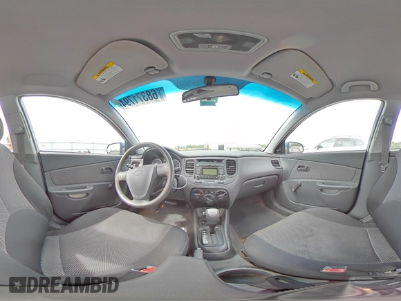 2009 Kia Rio LX with VIN KNADE223696530633, listed as a Copart auction lot 68371794 with 165,505 mi miles and Salvage Title. Bid and sale history available at DreamBid. Image 12.