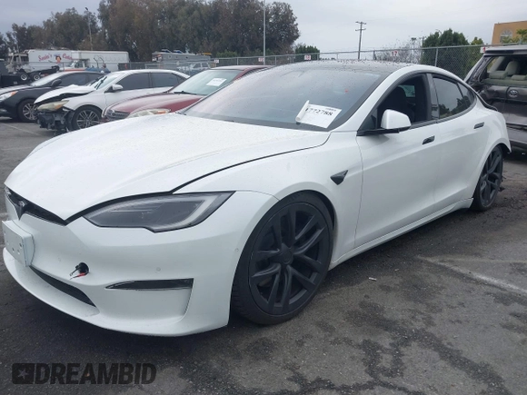 2022 Tesla Model S Plaid with VIN 5YJSA1E65NF488864, listed as a IAAI auction lot 41772788 with 33,915 mi miles and . Bid and sale history available at DreamBid. Image 19.