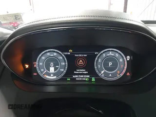 2020 Jaguar E-Pace SE z VIN SADFP2FX1L1Z88690, wystawiony jako IAAI lot #42273160 z przebiegiem 26 340 mil mil oraz . Historia ofert i sprzedaży dostępna na DreamBid. Obrazek 16.
