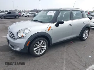 2013 MINI Countryman with VIN WMWZB3C5XDWM09519, listed as a IAAI auction lot 42665715 with 127,891 mi miles and . Bid and sale history available at DreamBid. Image 2.