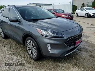 2021 Ford Escape Titanium Hybrid z VIN 1FMCU9DZ4MUA56645, wystawiony jako Copart lot #54059515 z przebiegiem 31 432 mil mil oraz Szkoda całkowita • Salvage title. Historia ofert i sprzedaży dostępna na DreamBid. Obrazek 14.