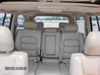 2004 Lexus LX 470 z VIN JTJHT00W743542910, wystawiony jako Copart lot #57187445 z przebiegiem 236 985 mil mil oraz Szkoda całkowita • Salvage title. Historia ofert i sprzedaży dostępna na DreamBid. Obrazek 10.