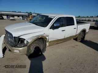 2012 Ram 1500 Laramie Longhorn with VIN 1C6RD7PT5CS346274, listed as a Copart auction lot 87855915 with 126,521 mi miles and Salvage title. Bid and sale history available at DreamBid. Image 1.