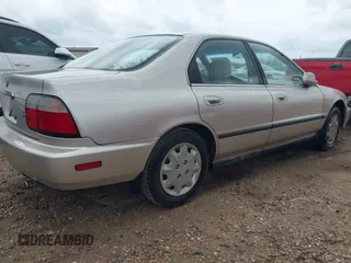 1997 Honda Accord LX with VIN JHMCD5638VC000719, listed as a IAAI auction lot 42190141 with 325,010 mi miles and . Bid and sale history available at carsss.com. Image 4.