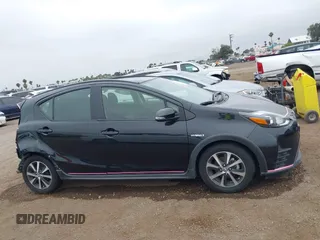 2018 Toyota Prius One z VIN JTDKDTB3XJ1606505, wystawiony jako IAAI lot #42425652 z przebiegiem 148 399 mil mil oraz . Historia ofert i sprzedaży dostępna na DreamBid. Obrazek 14.