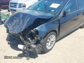 2016 Toyota Camry XLE with VIN 4T4BF1FK3GR535768, listed as a IAAI auction lot 41988698 with 157,452 mi miles. Bid and sale history available at carsss.com. Image 6.
