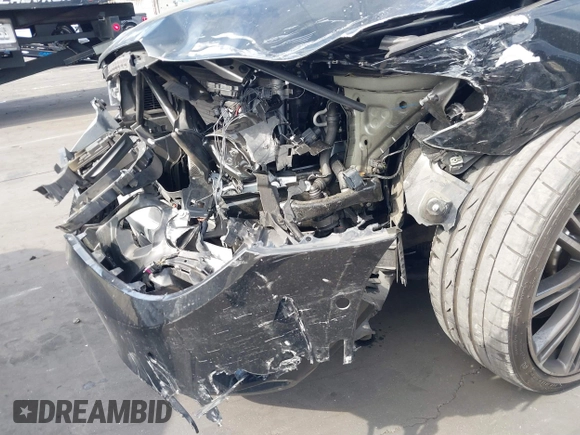2018 BMW 5 Series 540i z VIN WBAJE5C5XJWA97667, wystawiony jako IAAI lot #41481362 z przebiegiem Nie podano mil oraz . Historia ofert i sprzedaży dostępna na DreamBid. Obrazek 6.