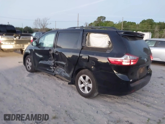 2015 Toyota Sienna LE AAS with VIN 5TDKK3DC2FS685245, listed as a IAAI auction lot 41849185 with 141,545 mi miles. Bid and sale history available at carsss.com. Image 3.