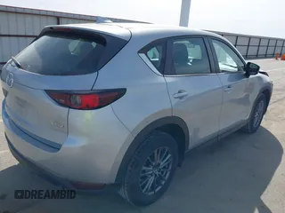 2019 Mazda CX-5 Sport with VIN JM3KFBBM6K1582760, listed as a IAAI auction lot 41822152 with 60,620 mi miles and . Bid and sale history available at DreamBid. Image 4.