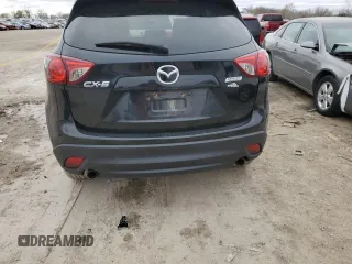 2016 Mazda CX-5 Touring z VIN JM3KE2CY0G0846699, wystawiony jako Copart lot #81785864 z przebiegiem 140 750 mil mil oraz Szkoda całkowita • Salvage title. Historia ofert i sprzedaży dostępna na DreamBid. Obrazek 6.